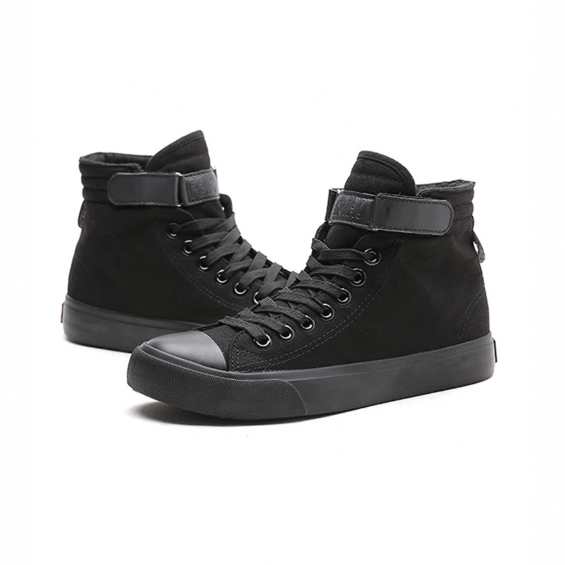Women's high top black lace-up sneakers designed for comfort and style, perfect for any rock outfit.
