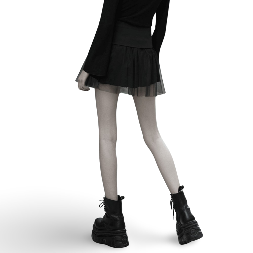 Model showcasing a High-Waist Black Gothic Skirt with lace-up detail and mesh hem, paired with chunky boots.
