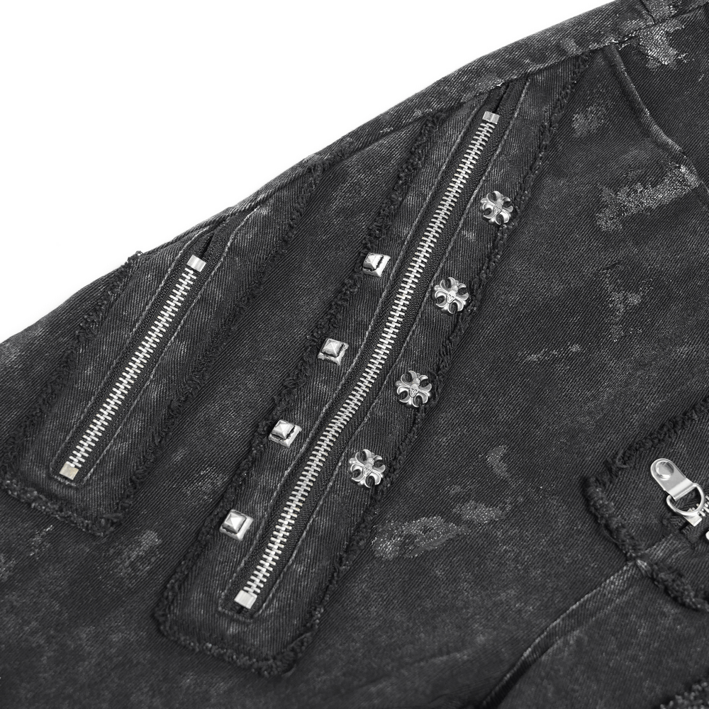 Close-up of punk flared jeans featuring zipper details and metal decor for edgy streetwear style.