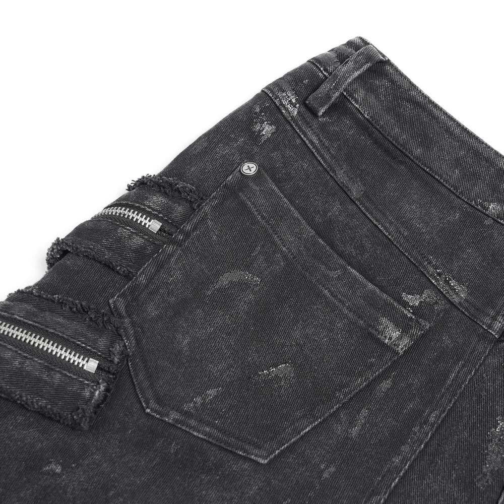 Close-up of black high waist flared jeans featuring zipper details and distressed accents, perfect for punk streetwear.