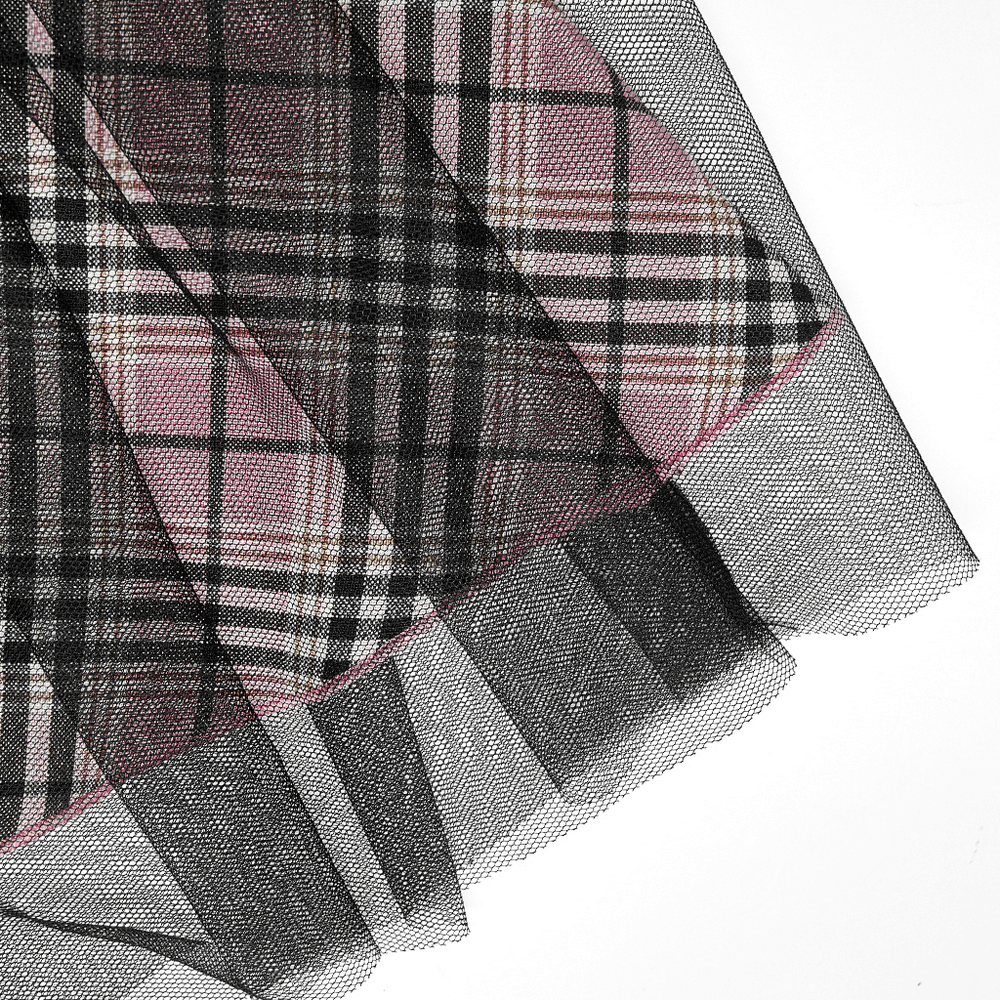 Pink plaid and mesh fabric detail of a high-waisted gothic mini skirt with edgy accents.