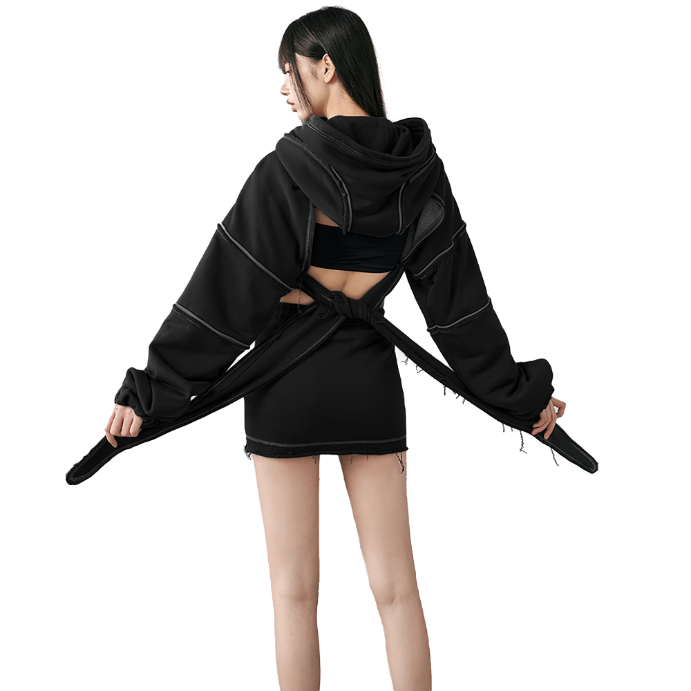 Women's hollow-out long sleeve black hoodie, showcasing cool backless design and trendy cropped fit.