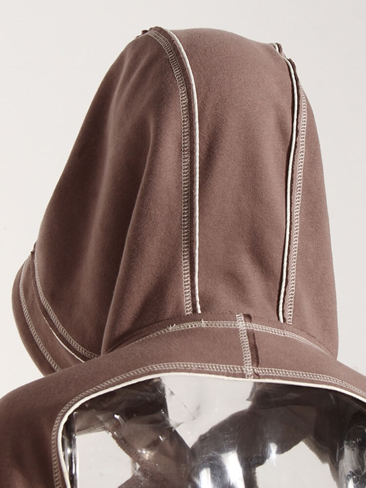 Back view of a trendy hollow-out long sleeves hooded sweatshirt for women in a stylish brown design.