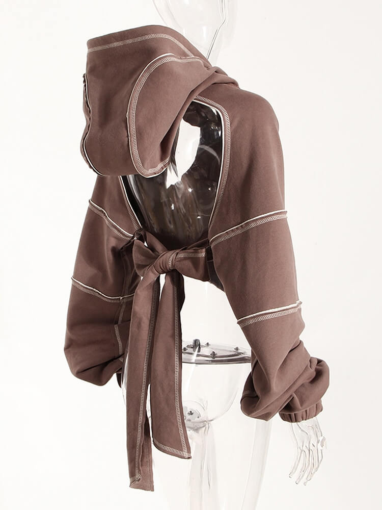 Cool brown hollow-out long sleeves backless crop hoodie for women, blending casual style with trendy design.
