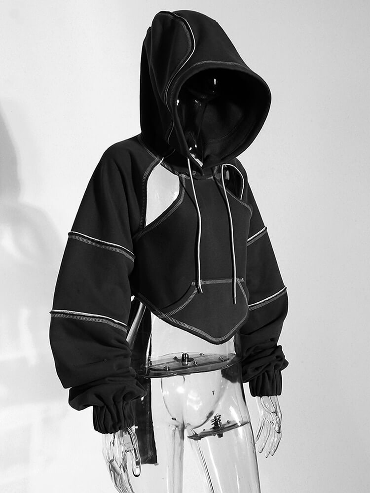 Chic hollow-out long sleeves hooded sweatshirt for women, showcasing a trendy backless crop design.