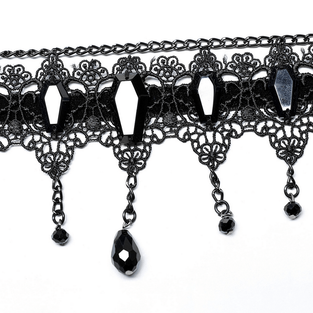 Hollowed lace choker necklace with black coffin beads and dangling chains for a Victorian goth look.