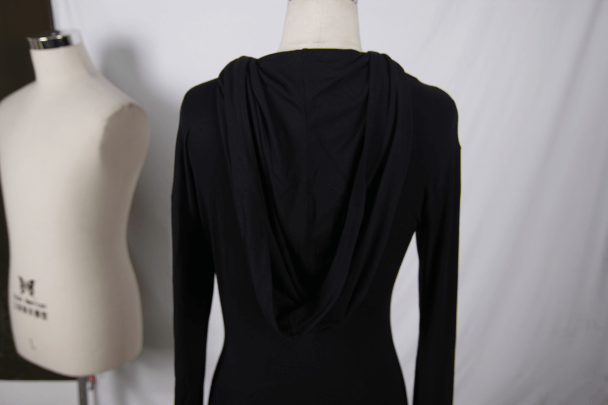 Back view of a women's black hooded mini dress showcasing gothic style and flared sleeves, perfect for alternative fashion.