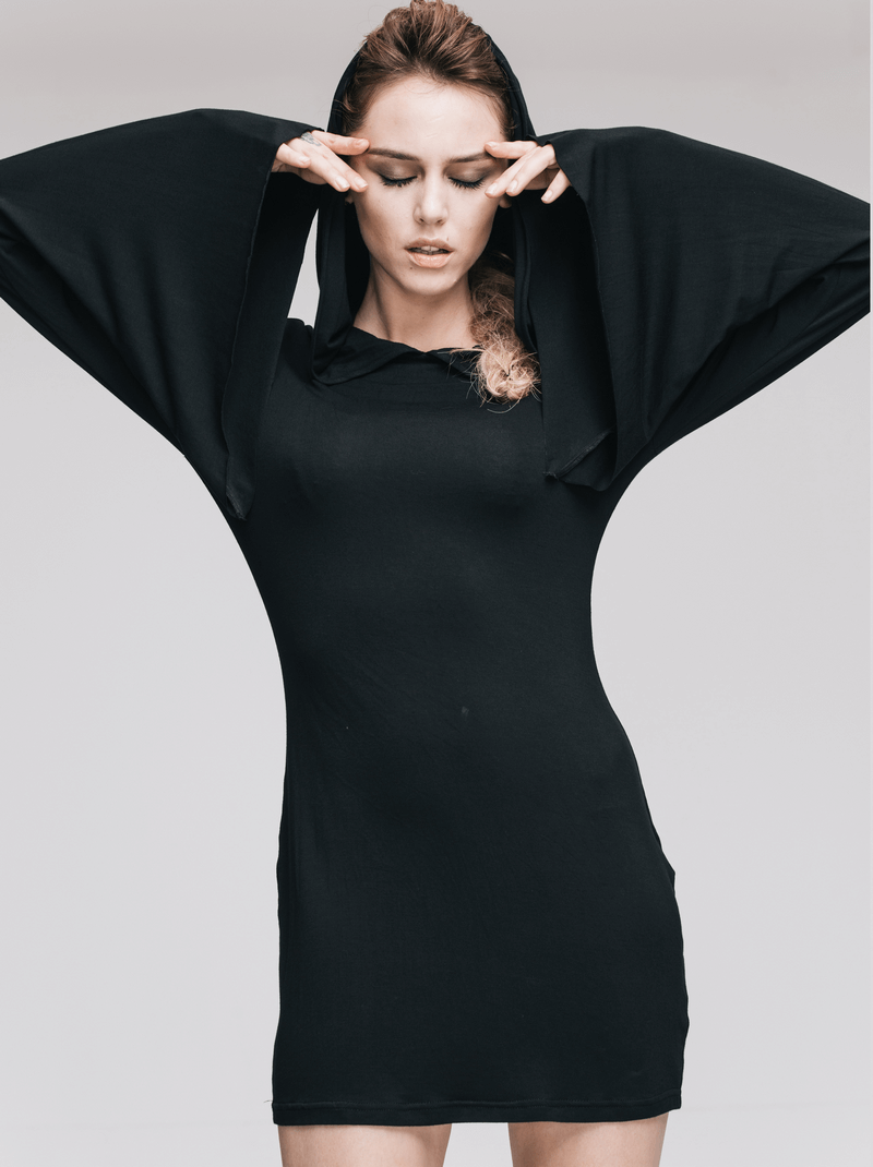 Gothic black mini dress with hood and flared sleeves worn by a model in a stylish pose, perfect for alternative fashion.