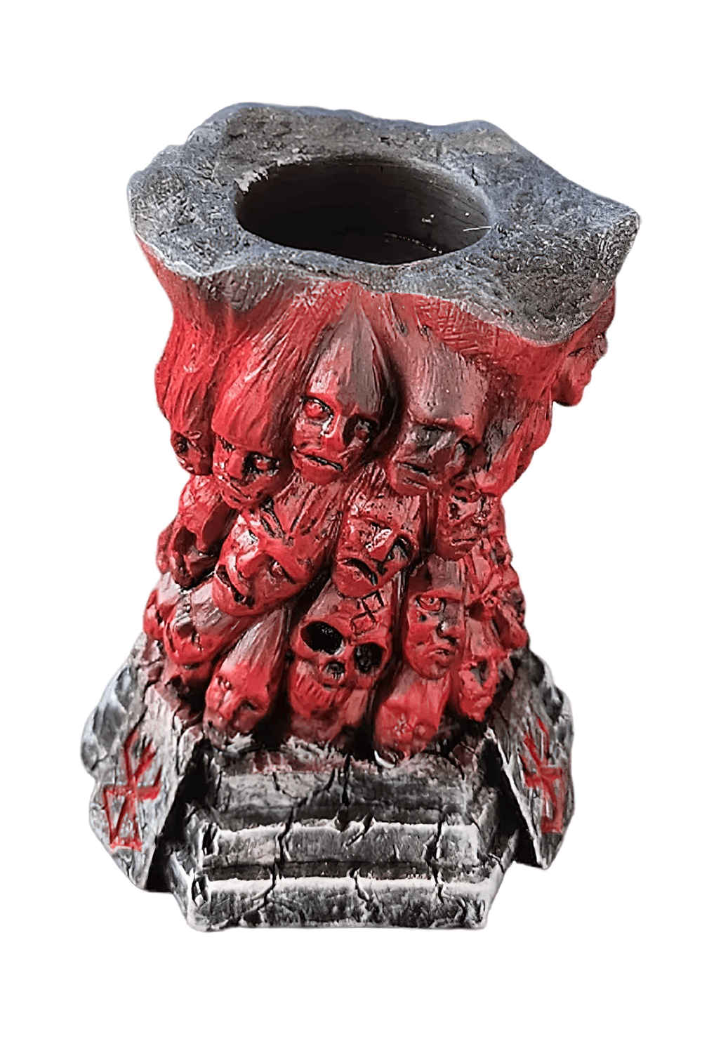 Horror Skull Tealight Holder for Gothic Decor featuring a sinister red and black candle holder with carved skulls.