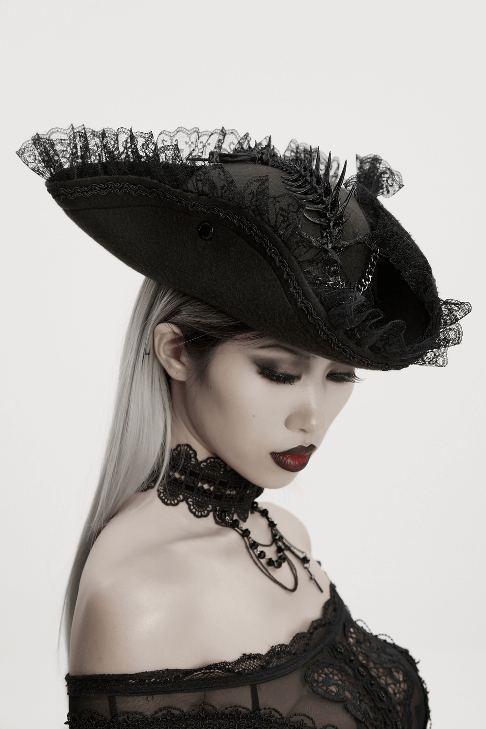 Imprisoned Beast Bone Pirate Hat with Gothic Lace Details worn by a model showcasing its intricate design.