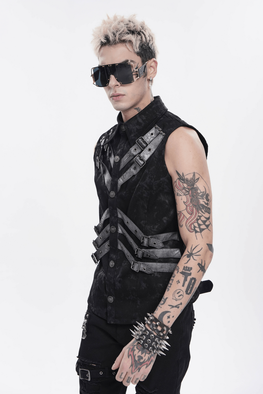 Industrial Gothic Buckle Strap Sleeveless Shirt worn by a model with sunglasses and tattoos, showcasing punk style.