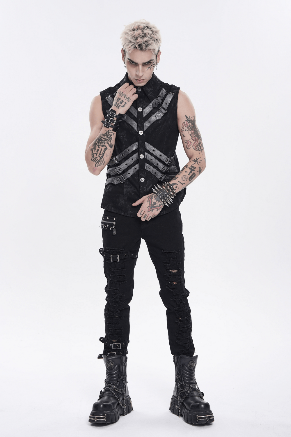 Industrial Gothic Buckle Strap Sleeveless Shirt worn by a model with punk style, showcasing layered buckle straps and tattoos.