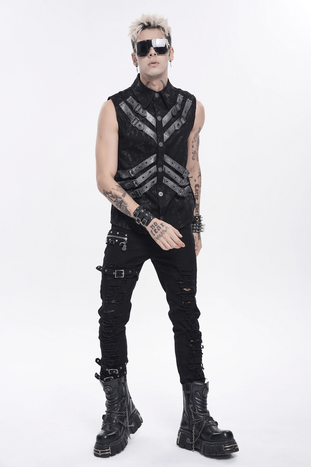 Industrial Gothic Buckle Strap Sleeveless Shirt worn by model in punk style with harness straps and black distressed design.