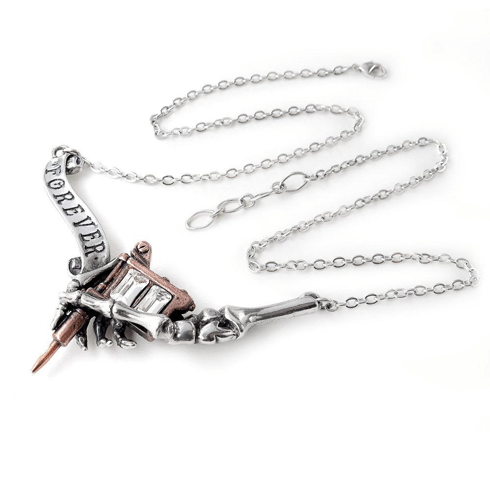 Inked Skull Necklace with Ribbon Forever and Crystals features a skull with a 'Forever' banner and crystals.