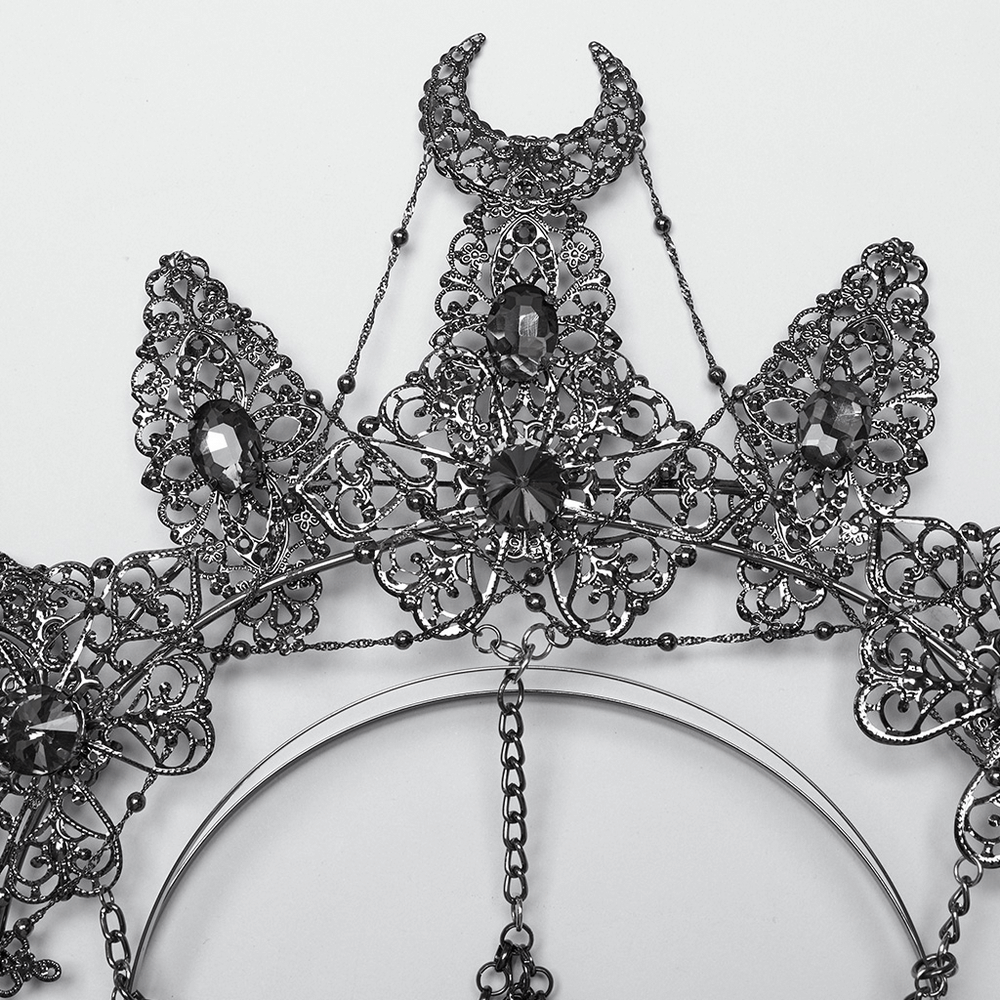 Intricate metal crown with skull pendants, chains, and gemstone halo for a gothic touch.