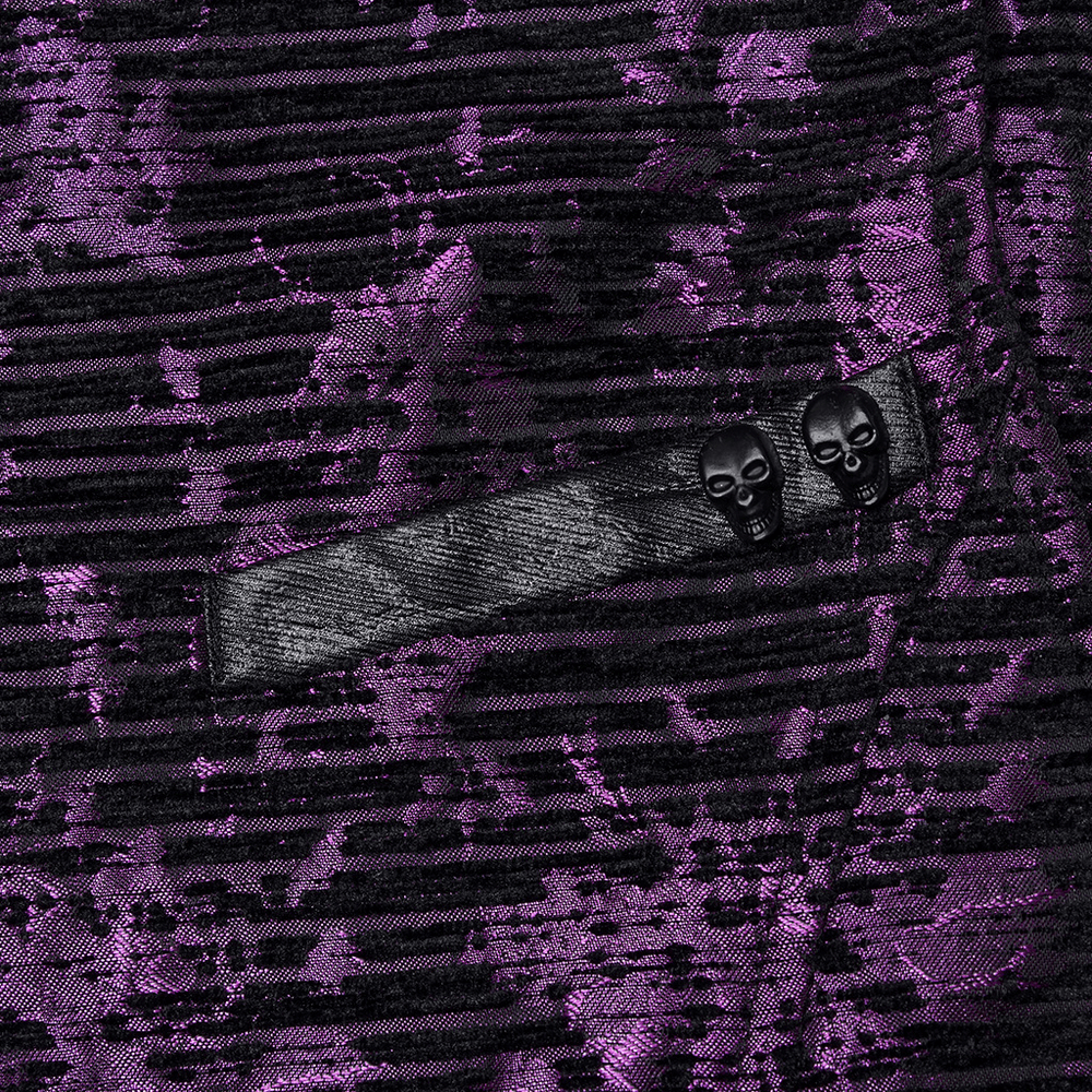 Close-up of the purple jacquard fabric showcasing skull embellishments on a Gothic waistcoat pocket.