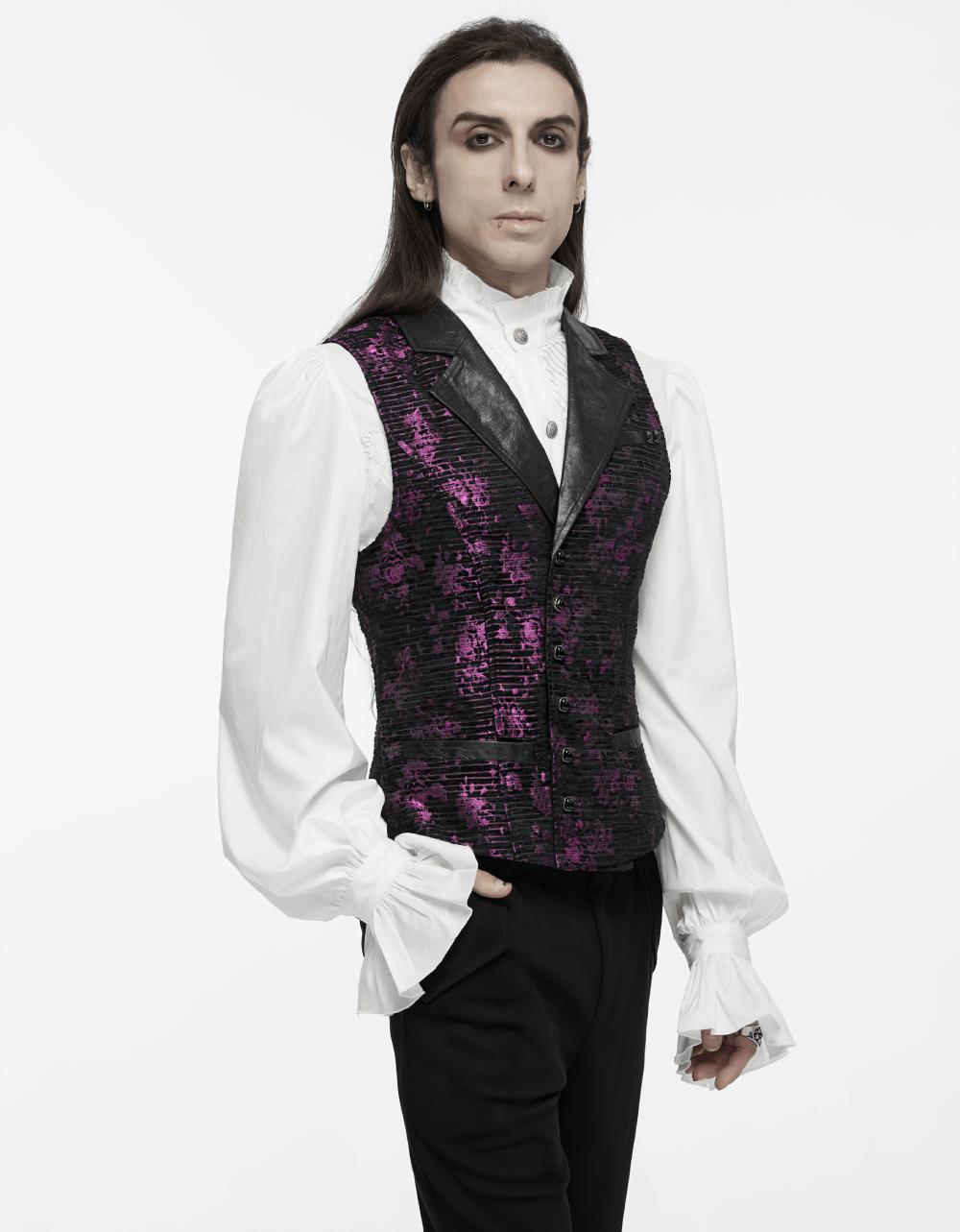 Stylish model wearing a Gothic jacquard waistcoat with leather details and a gemstone buckle, showcasing an elegant look.