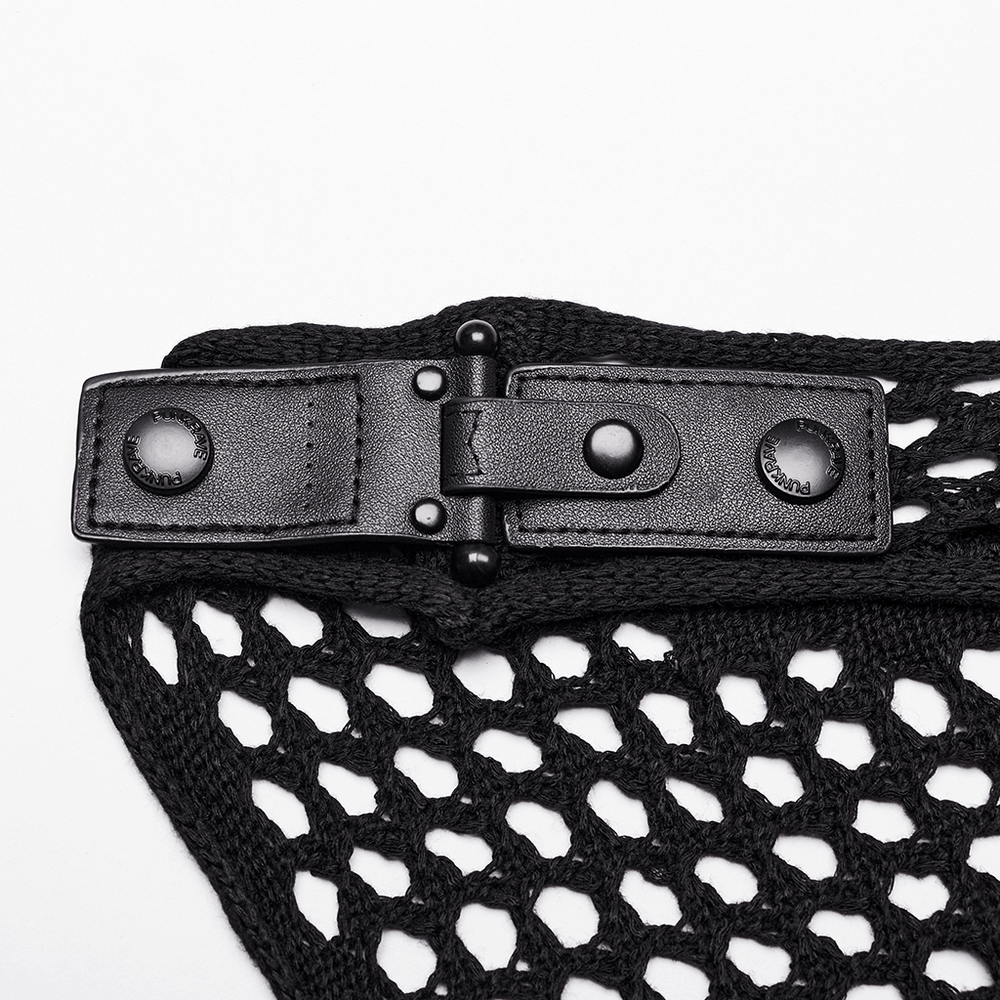 Close-up of a black techwear dress buckle highlighting edgy post-apocalyptic design with intricate mesh.