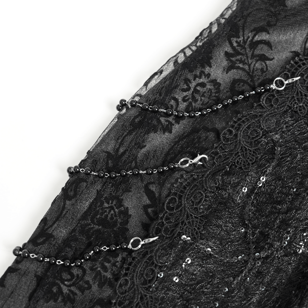 Lace and Fringe Black Skirt with Chains for Elegance Style featuring intricate lace and chain detailing.