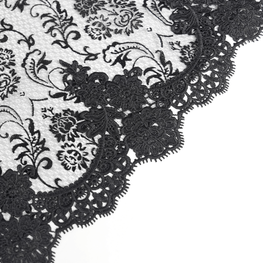 Lace and Fringe Black Skirt with Chains for Elegance Style detailed lace close-up showcasing intricate floral patterns.