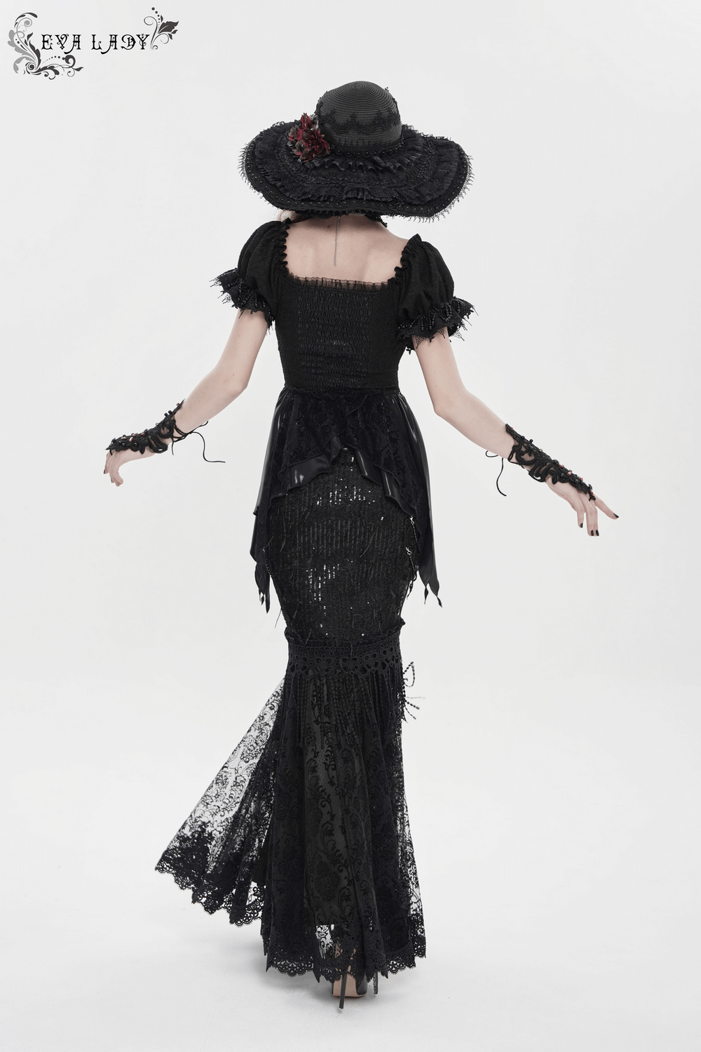Lace and Fringe Black Skirt with Chains for Elegance Style showcasing gothic design and elegant silhouette from the back.