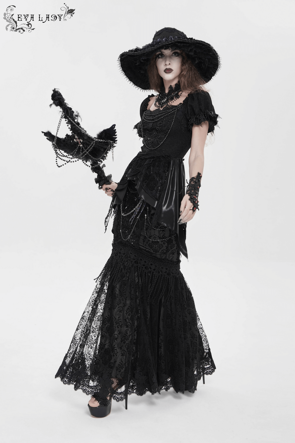 Lace and Fringe Black Skirt with Chains for Elegance Style worn by a model showcasing gothic fashion.