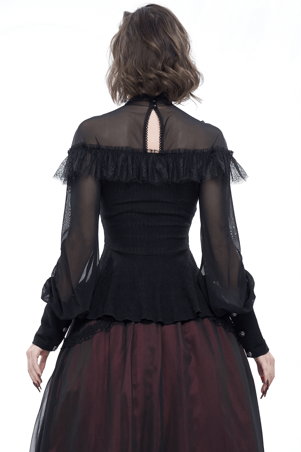 Back view of women's gothic black blouse with lace details and transparent sleeves, styled with a vintage beaded insert.