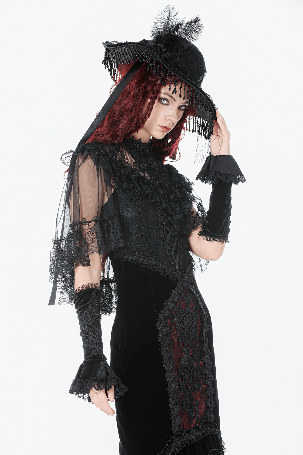 Lace Cape Shrug with High Neck and Rosette Trim worn with a gothic hat and stylish accessories.