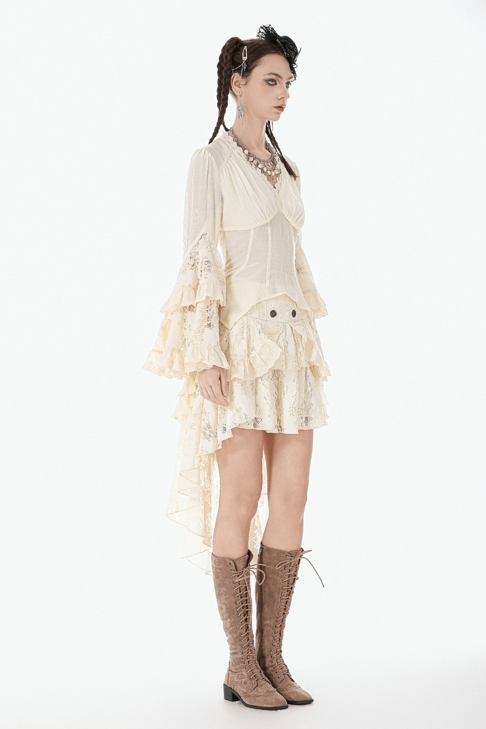 Lace Detail Gothic Bell Sleeved Top with Corset Back worn with layered ruffled skirt and knee-high lace-up boots.