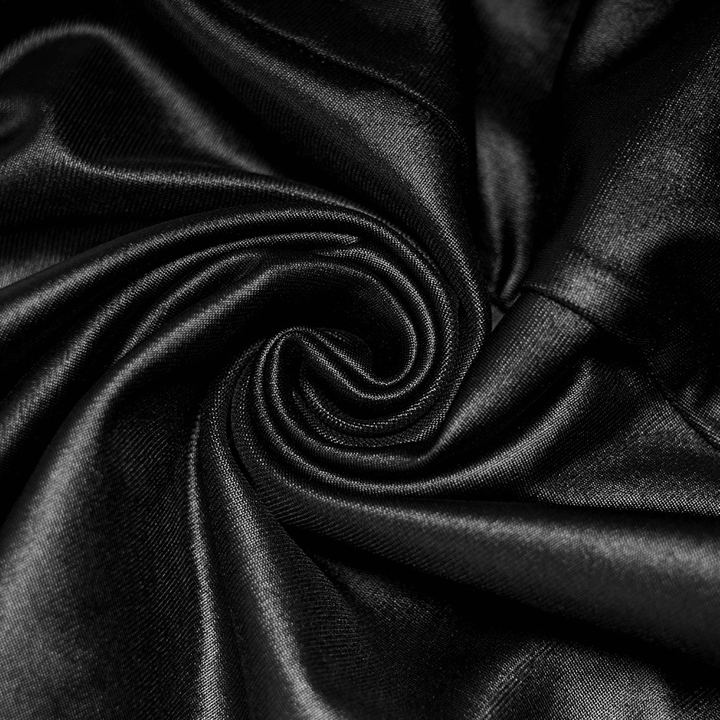 Soft black fabric swirl showcasing luxurious texture, ideal for gothic leggings and stylish outfits.