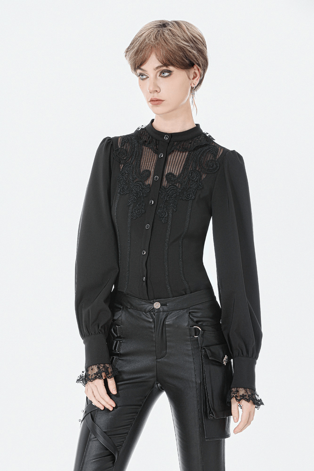 Lace Detail Victorian-Inspired Long Sleeve Black Blouse modeled with stylish black pants, showcasing elegance and gothic charm.