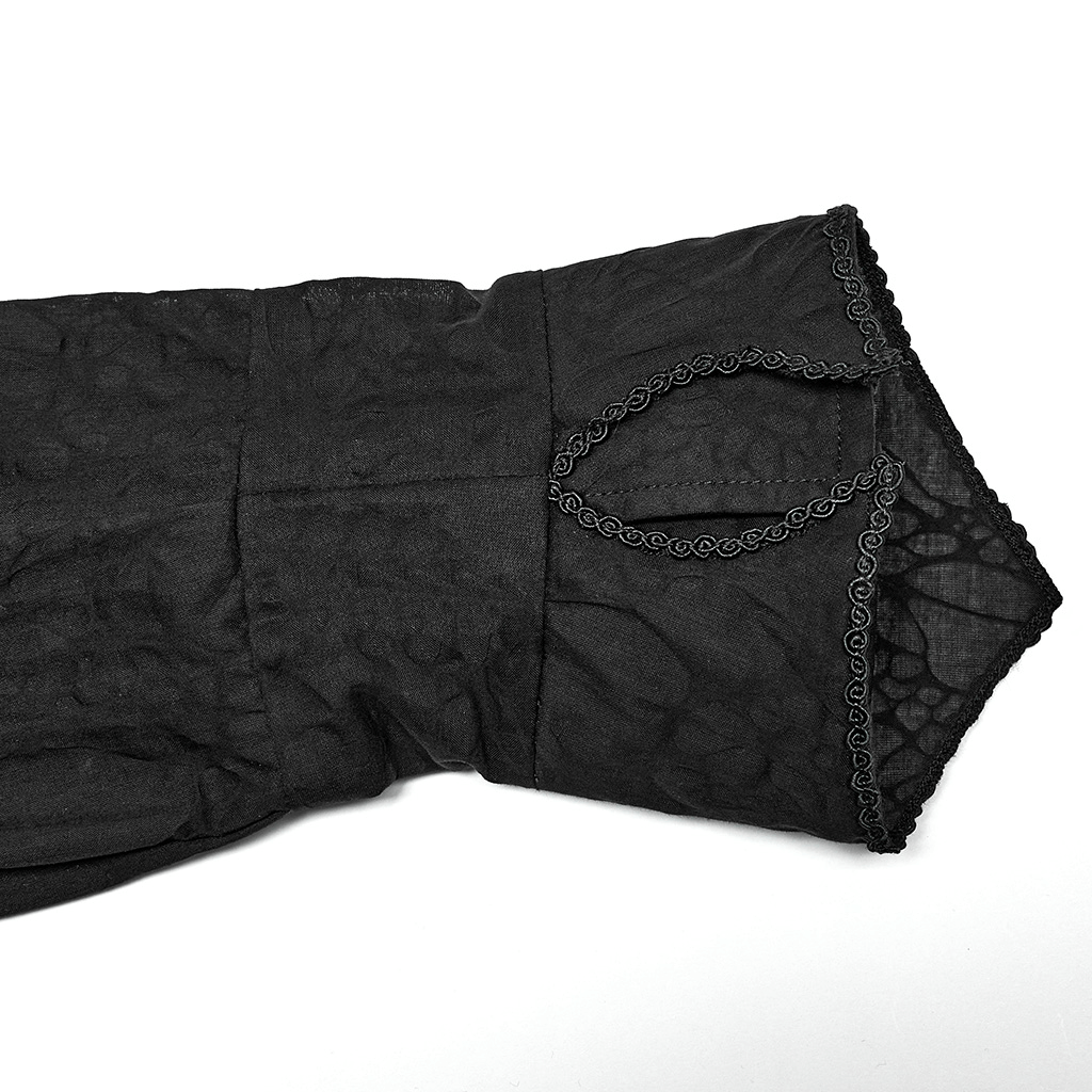 Close-up of lace-detailed cuff of a Victorian-inspired gothic button-up tailored shirt.