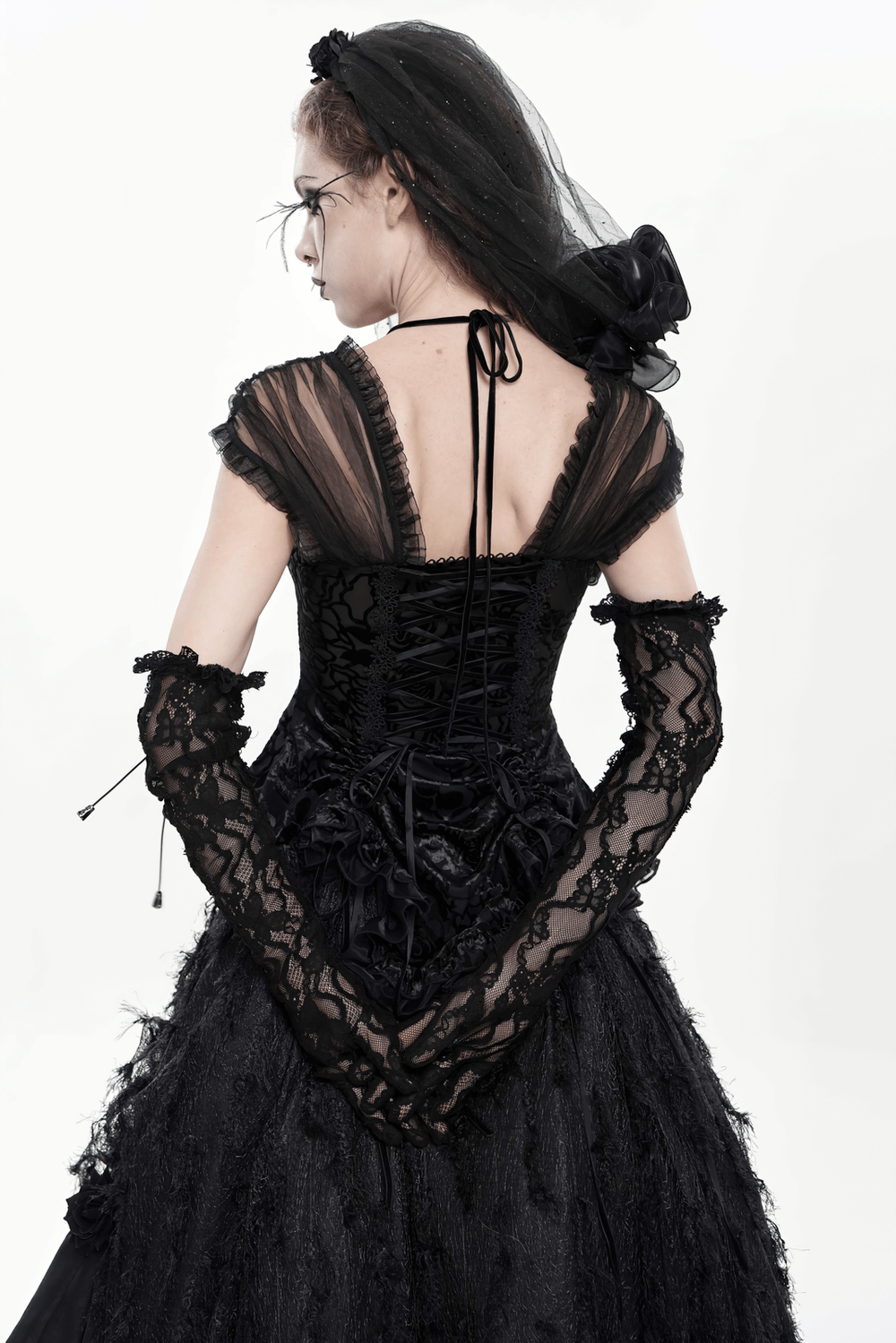 Lace Elegant Gothic High Gloves with Chain Details worn with a black gothic dress, showcasing intricate lace and elegant style.