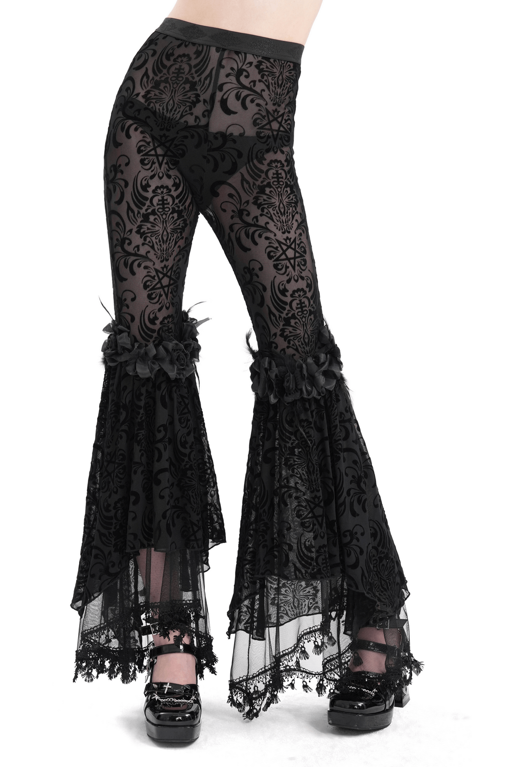 Gothic lace flare pants with velvet patterns and ruffles for a dark elegance look.