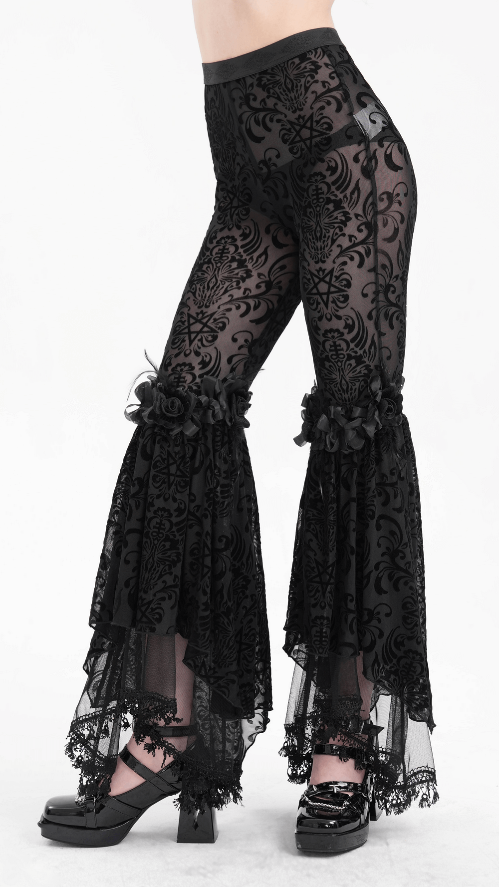 Gothic lace flare pants with velvet patterns and ruffled lace detail, perfect for festivals and night outs.