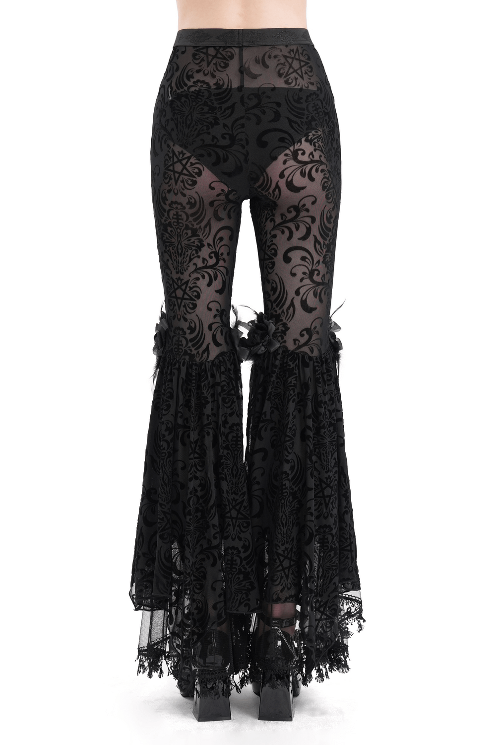 Gothic lace flare pants with velvet pattern and ruffled details, perfect for dramatic style and festivals.