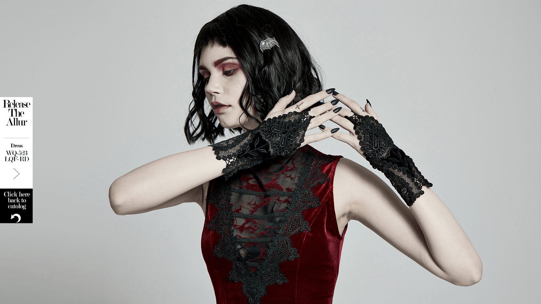 Elegant gothic gloves with lace floral design and heart decal, perfect for a romantic dark style.