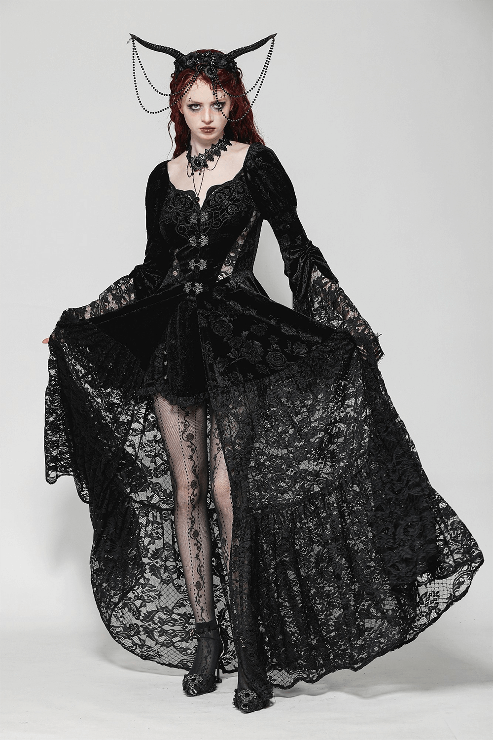 Victorian-inspired black lace evening cape with floral accents, perfect for formal events and gothic fashion.