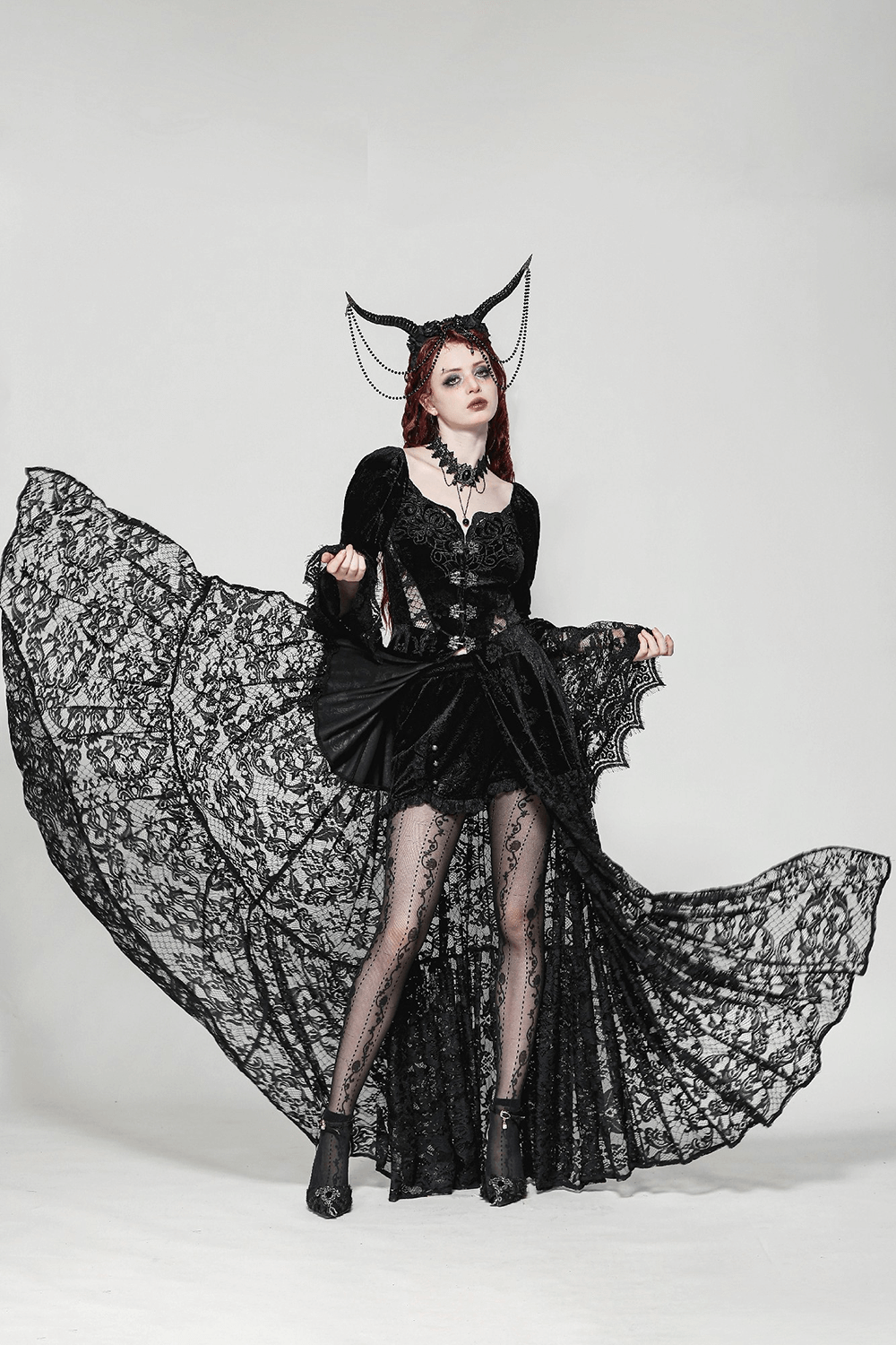 Elegant black lace gothic evening cape with floral accents and long sleeves, perfect for formal events.