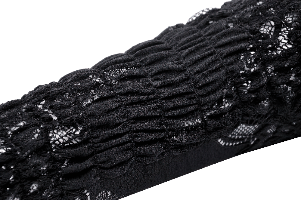 Close-up of black lace long fingerless gloves with frills and ruffles showcasing intricate lace detailing.