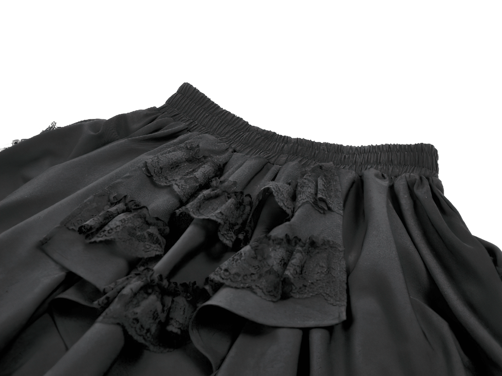 Spitzenbesetzter, geschichteter schwarzer Tüllrock mit Schleifendetail