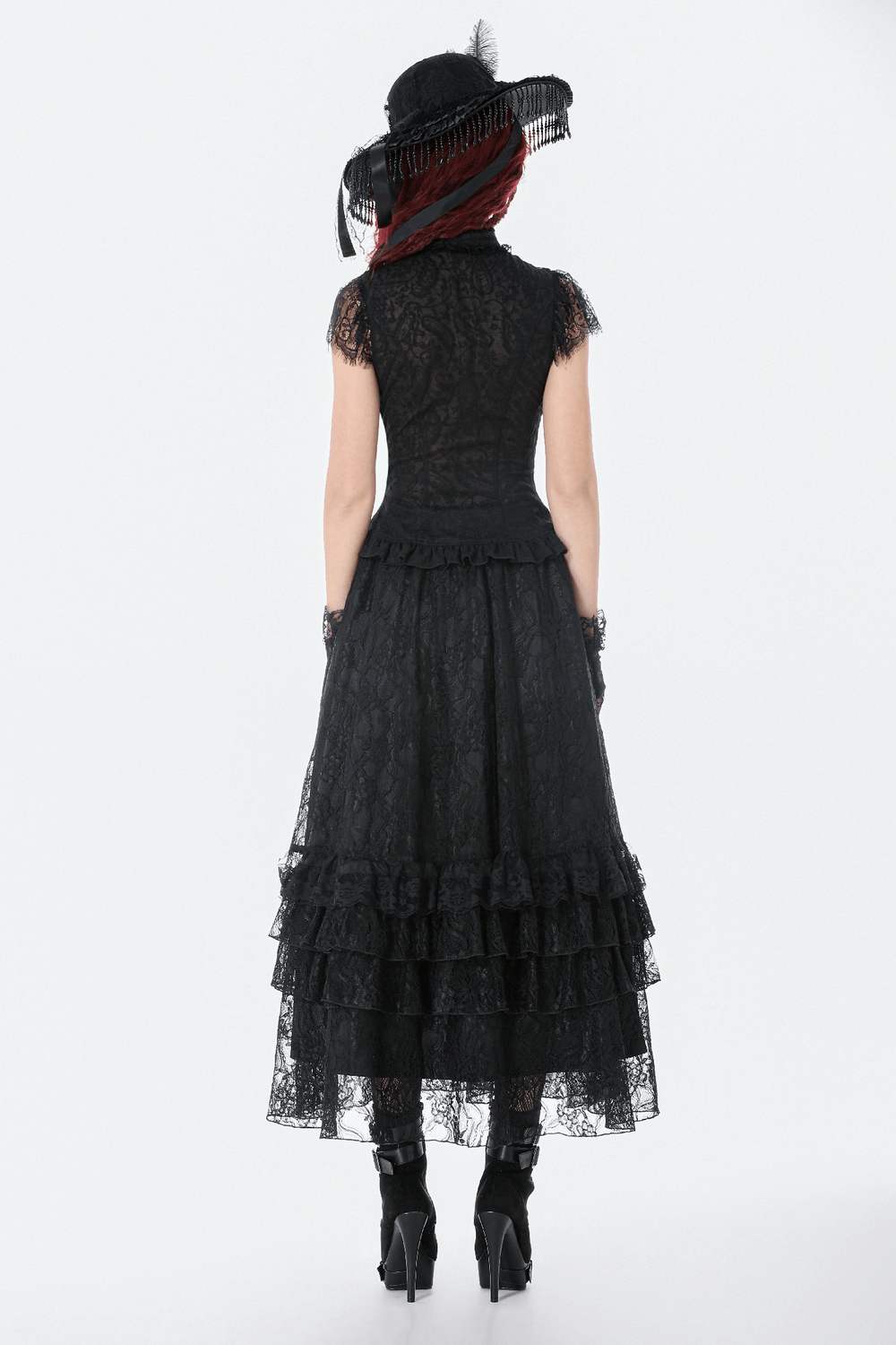 Lace Layered Skirt with Drawstring Waist and Ruffled Hem worn with a black lace top and elegant hat from the back.