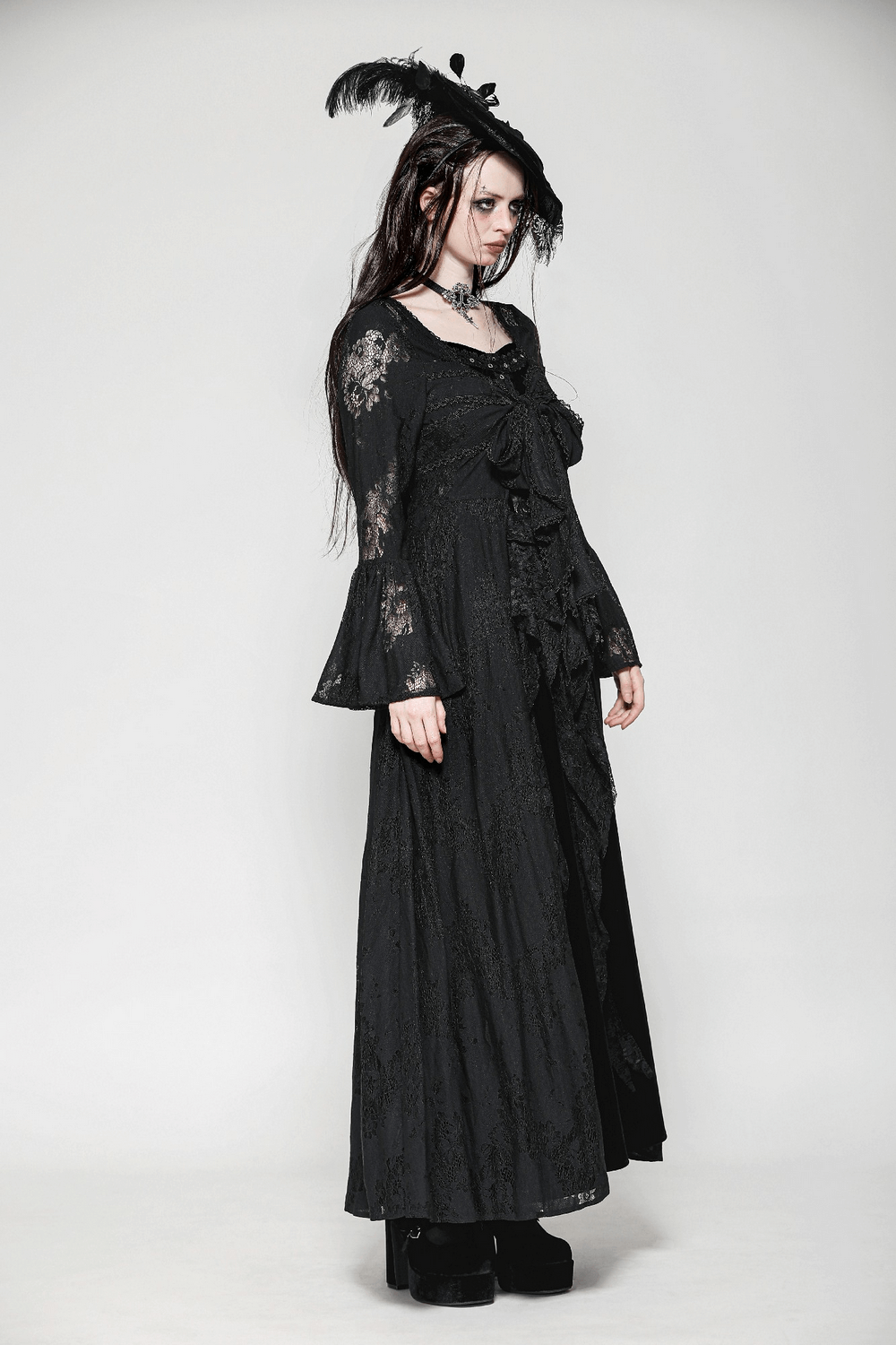 Gothic lace cape with bell sleeves and floral patterns, featuring a bow tie, perfect for alternative fashion.