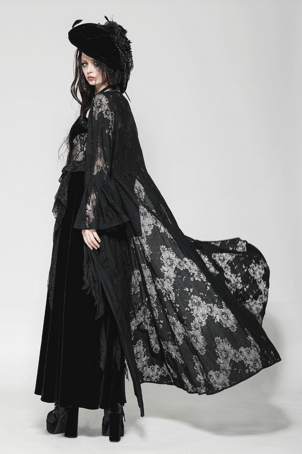 Elegant lace long sleeved cape with floral pattern and bow tie, perfect for gothic fashion lovers.