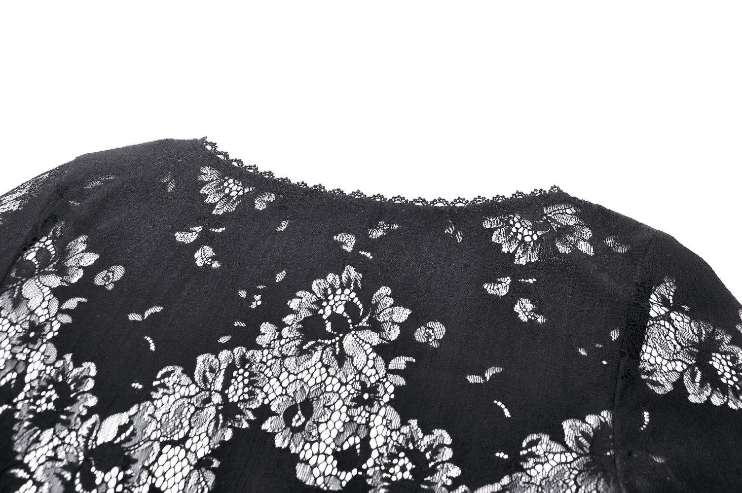 Elegant black lace fabric with floral patterns, showcasing intricate details and a vintage style.