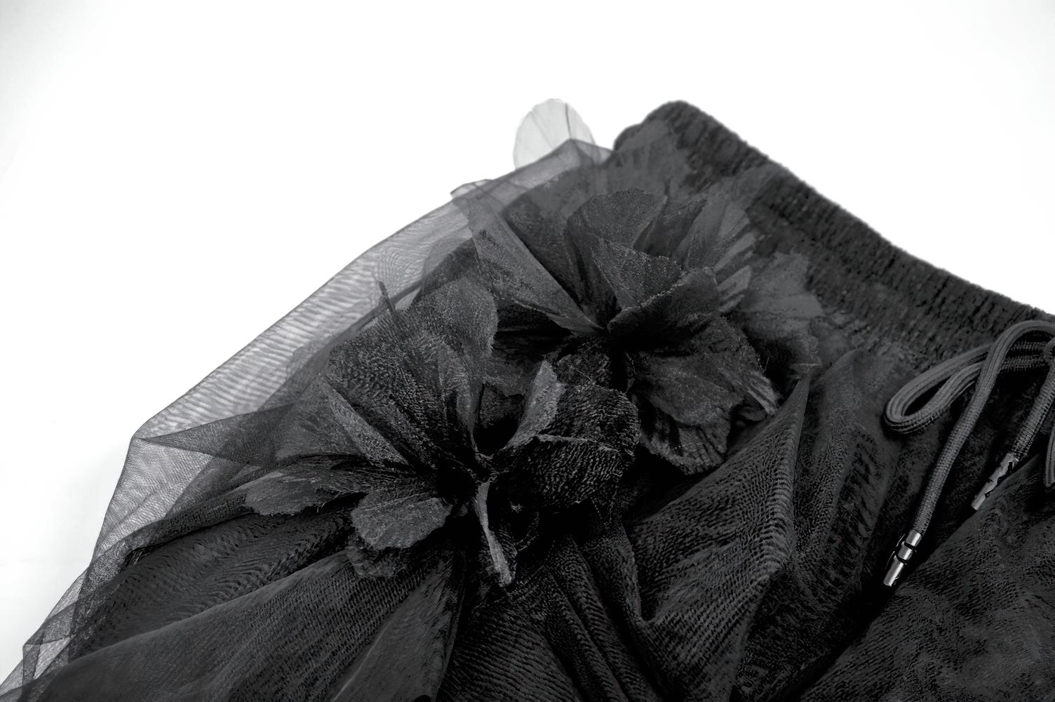 Lace Maxi Skirt with Sheer Mesh Layers and Floral Trim featuring black floral details and tulle overlay.