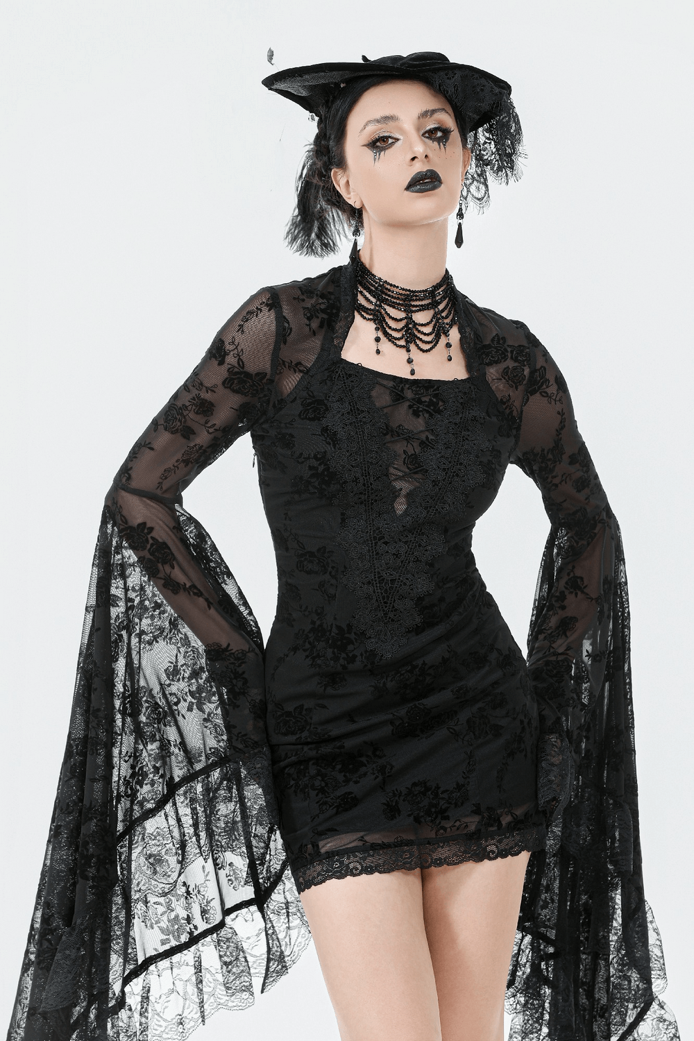 Lace Mini Dress with Bell Sleeves and Back Lace-up Design featuring dark floral lace, dramatic sleeves, and a corset back.