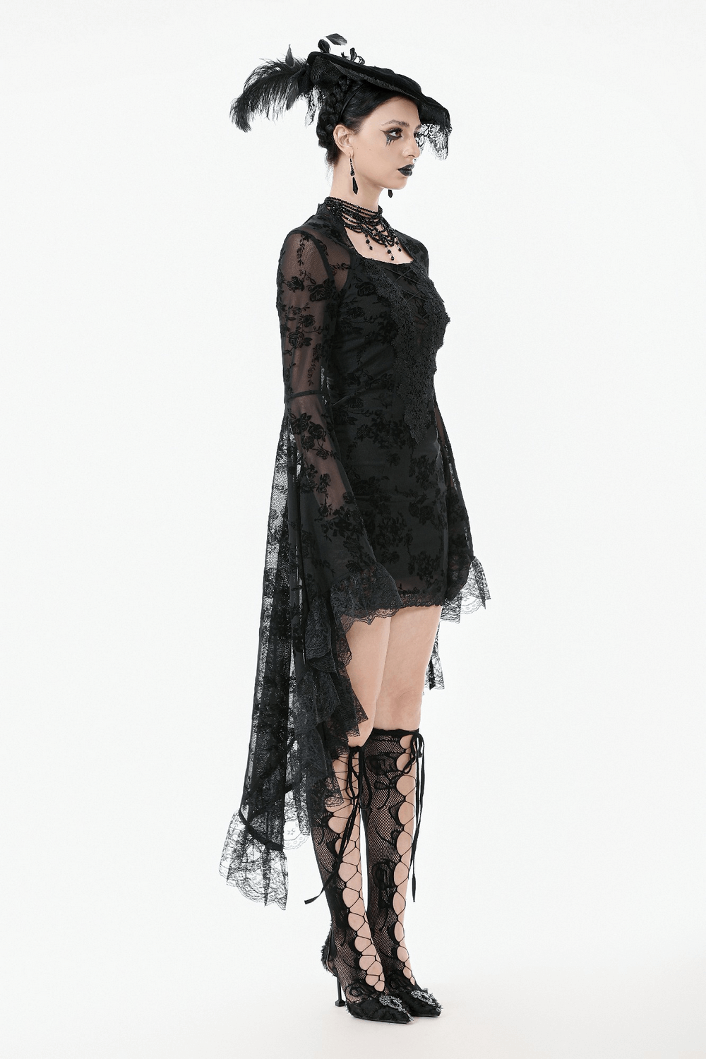 Lace Mini Dress with Bell Sleeves and Back Lace-up Design on a model in gothic style, showcasing dark floral lace and dramatic sleeves.