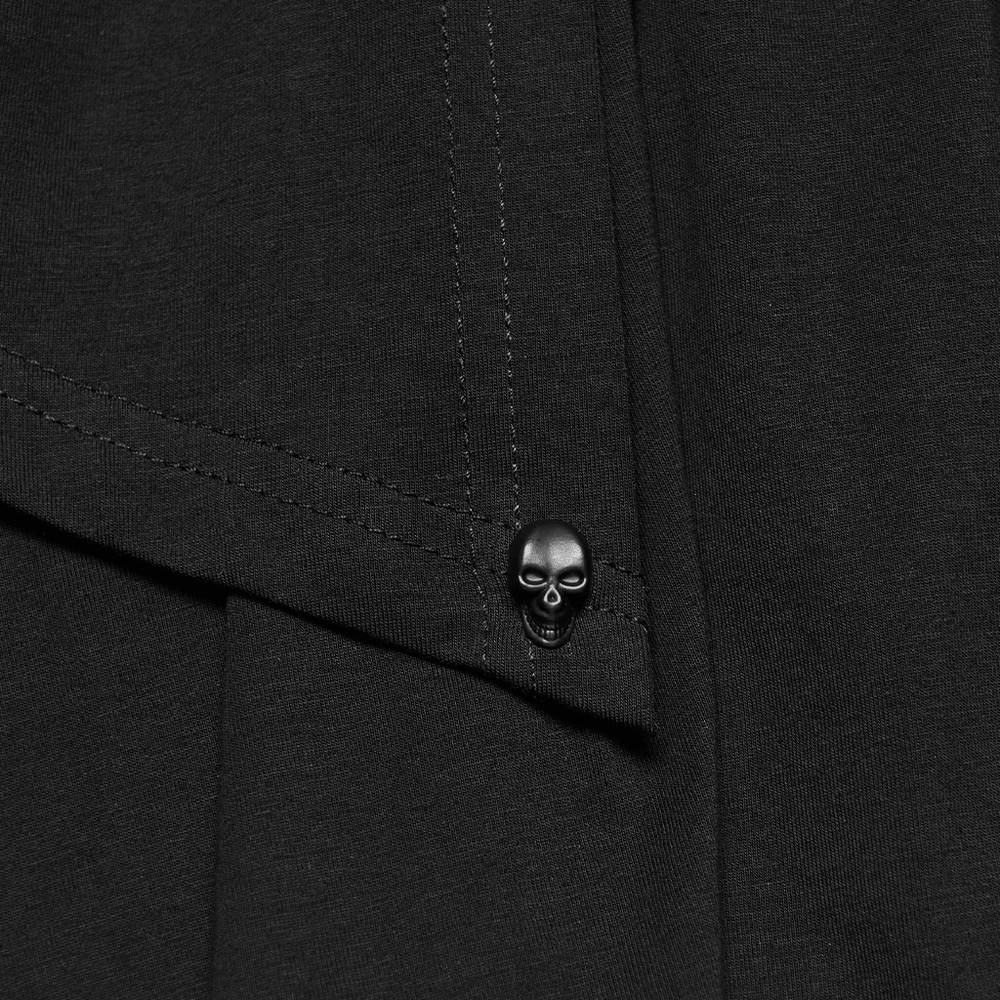 Skull detail on black fabric showcasing Gothic style for Lace Mini Dress with Mesh Cold Shoulders in Gothic Style.
