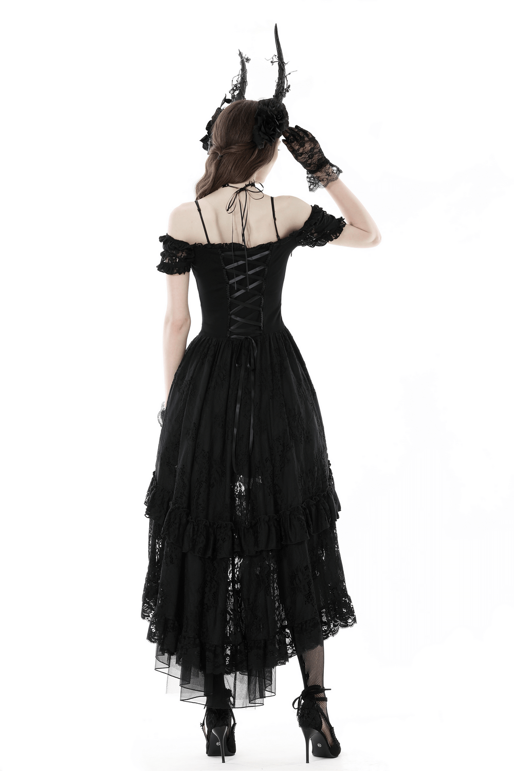 Back view of a black lace off-shoulder gothic dress with high-low hem and intricate detailing.